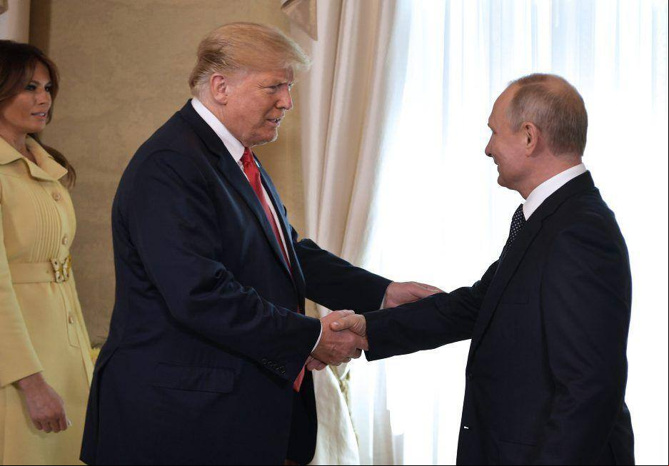 000_17Q1COjpg Putin e Trump em encontro em 2018. (Crédito: AFP Photo/Sputnik/Aleksey Nikolsky)